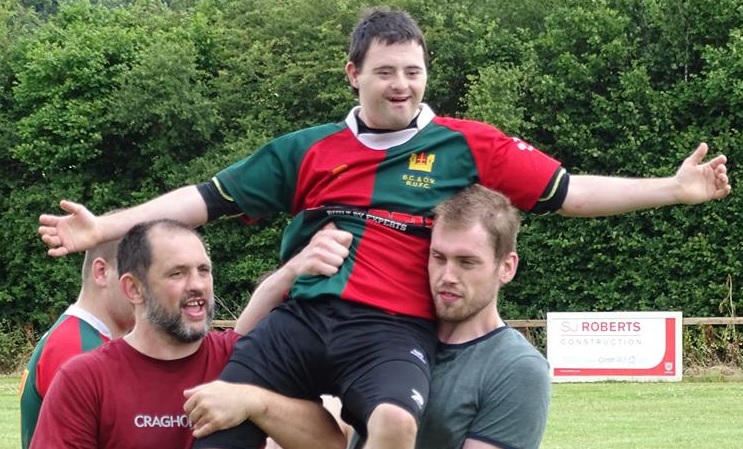 Zac playing rugby