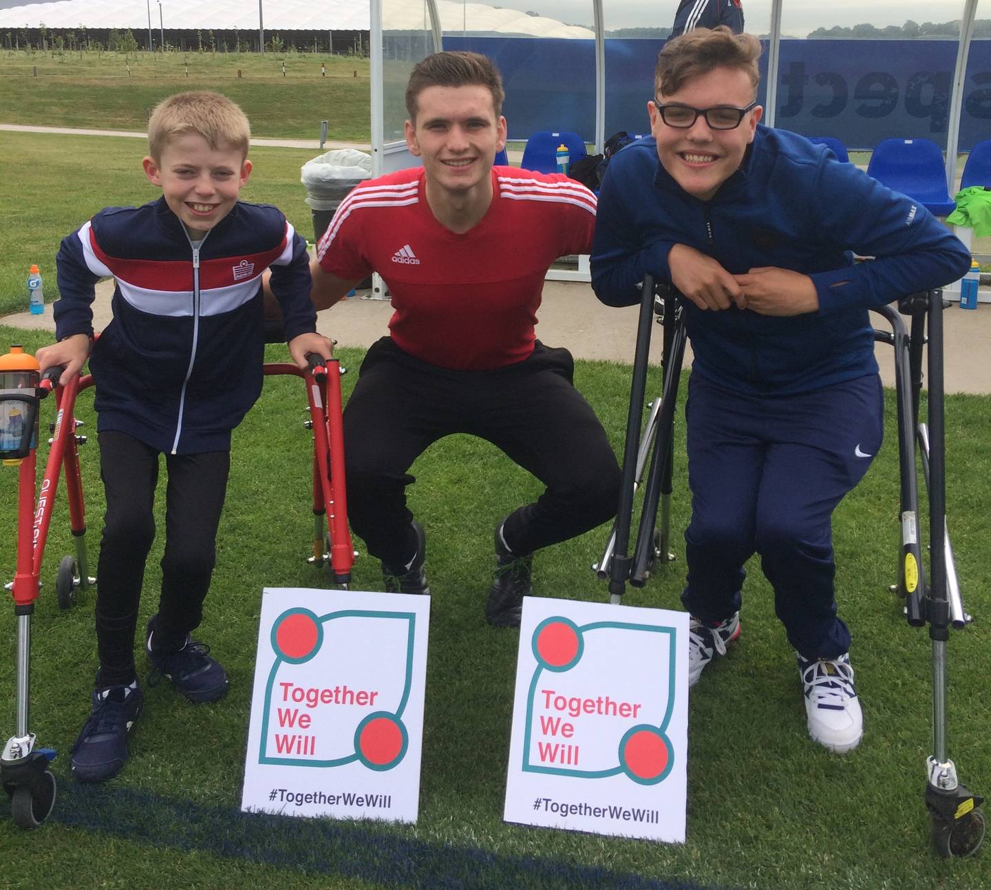 Young frame football players on pitch at St Georges Park.