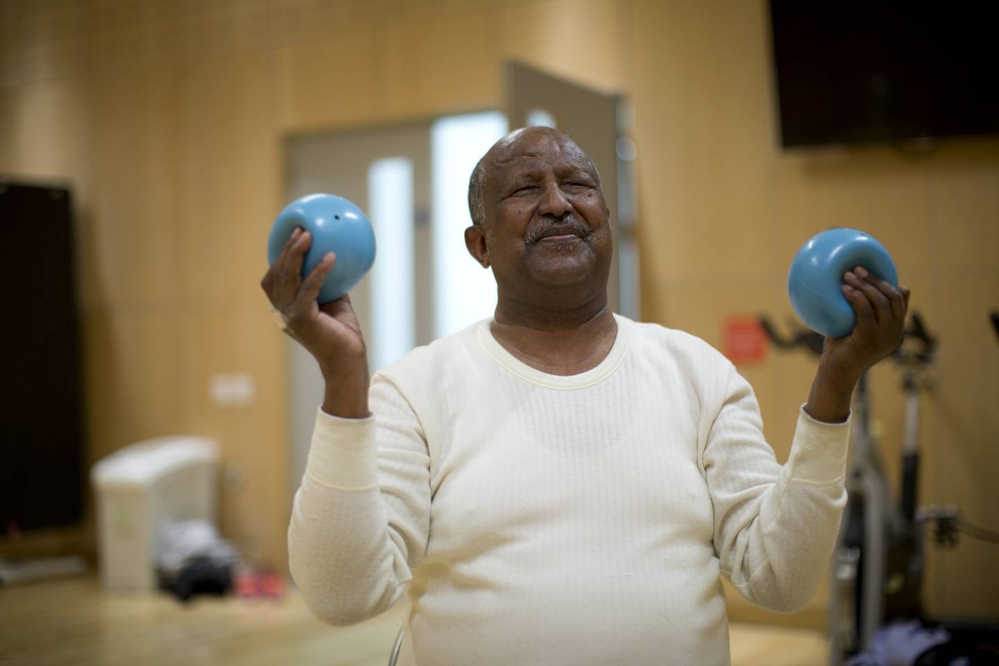 Tesfai Berhane taking part in a yoga session