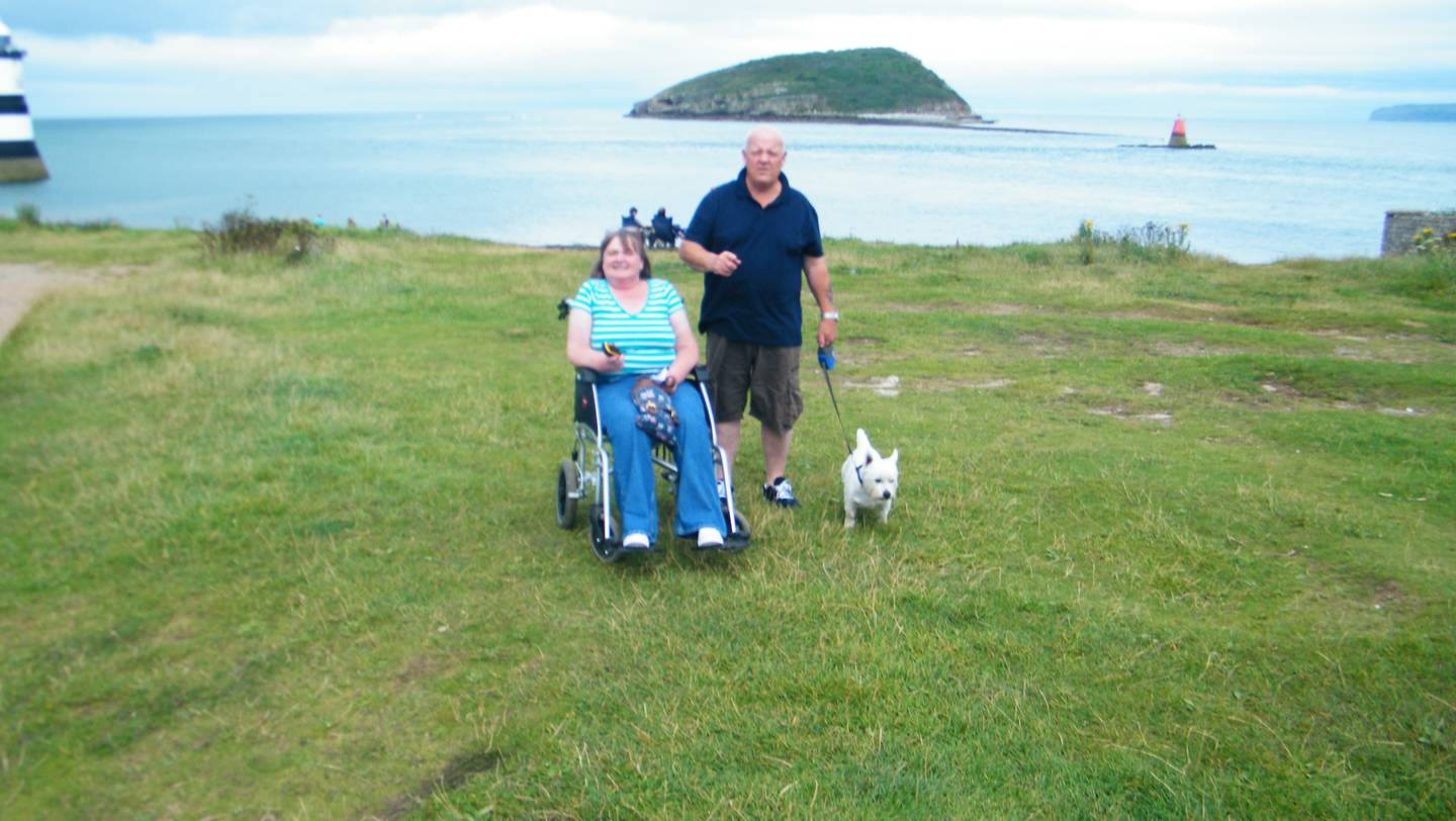 Jackie and her husband geocaching