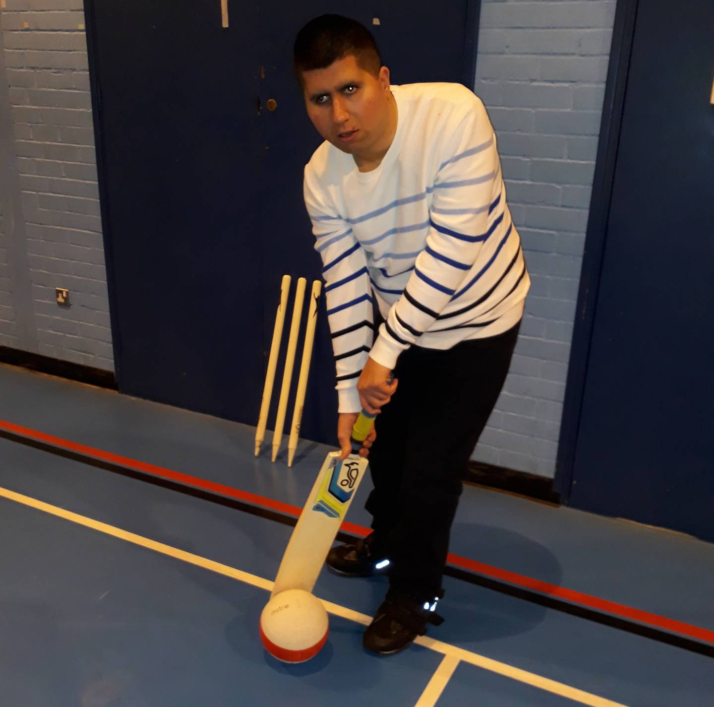 Owais giving a cricket demonstration 