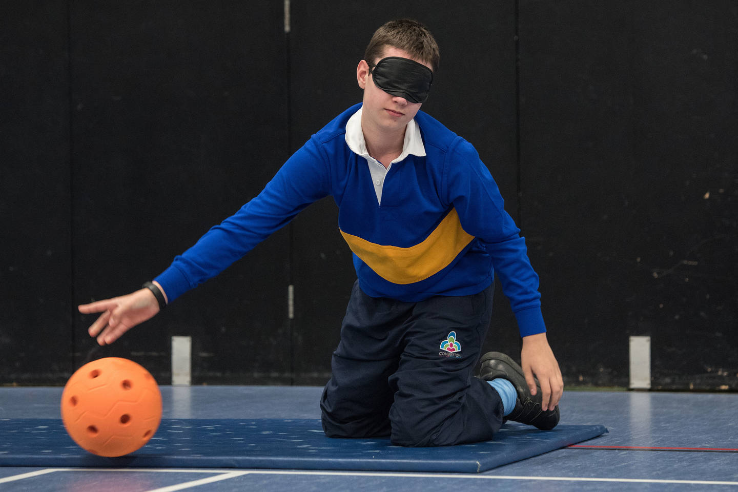 Boy playing goalball