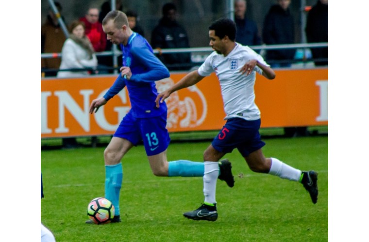 Martin playing for England. 