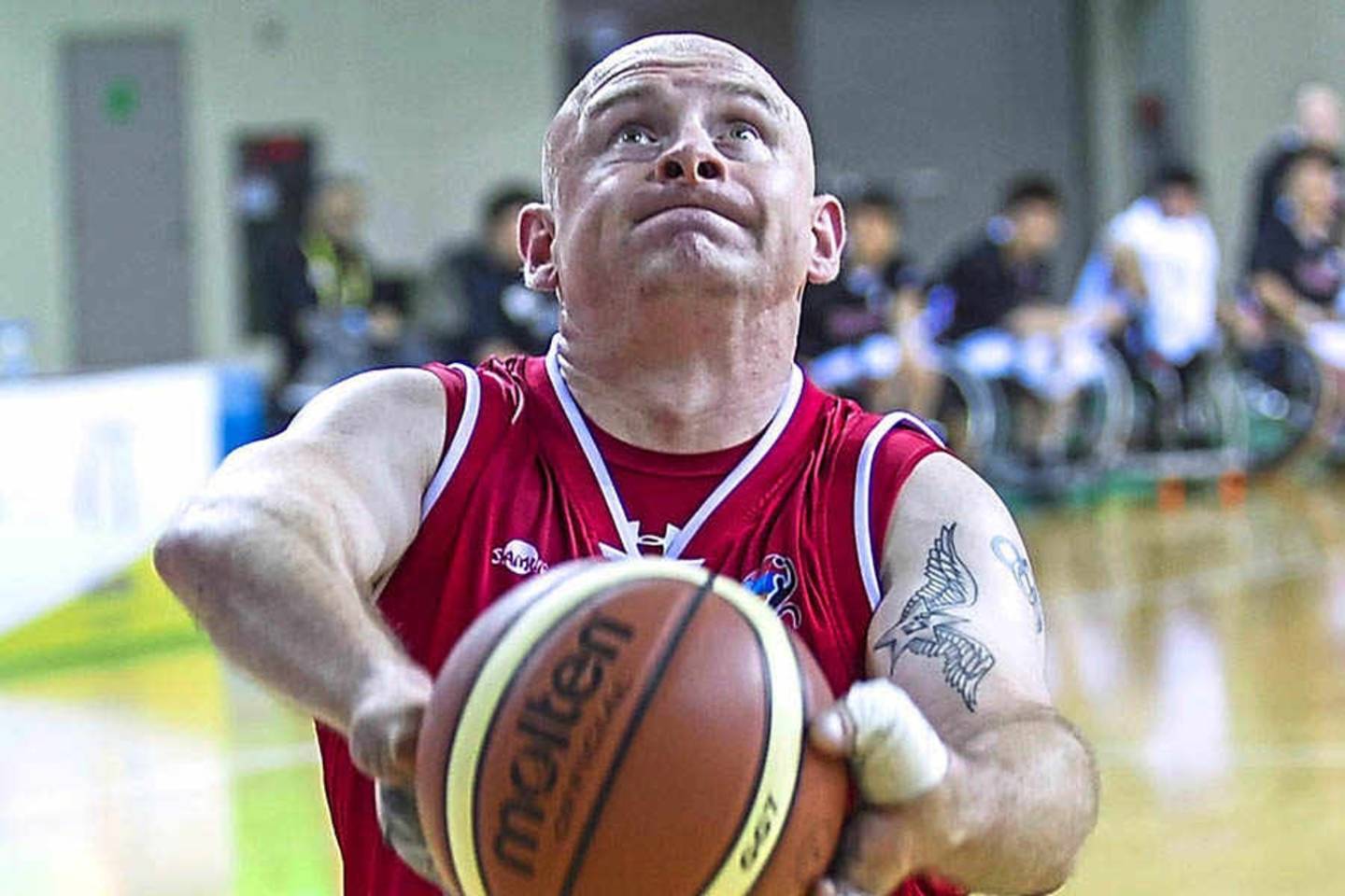 Mark Fosbrook playing wheelchair basketball