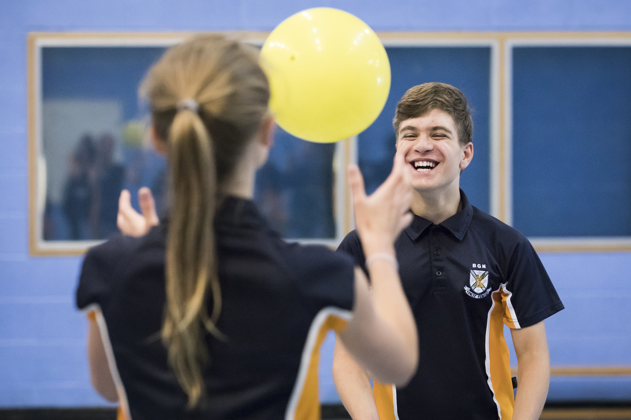 Two school children taking part in inclusive PE lesson