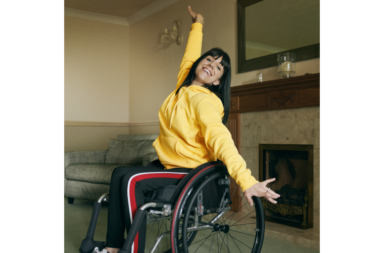 Rebecca dancing in her wheelchair