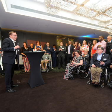 Barry speaking to guests at 20th birthday celebration