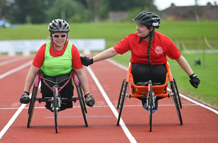 Two athletes at Activity Alliance National Junior Athletics Championships