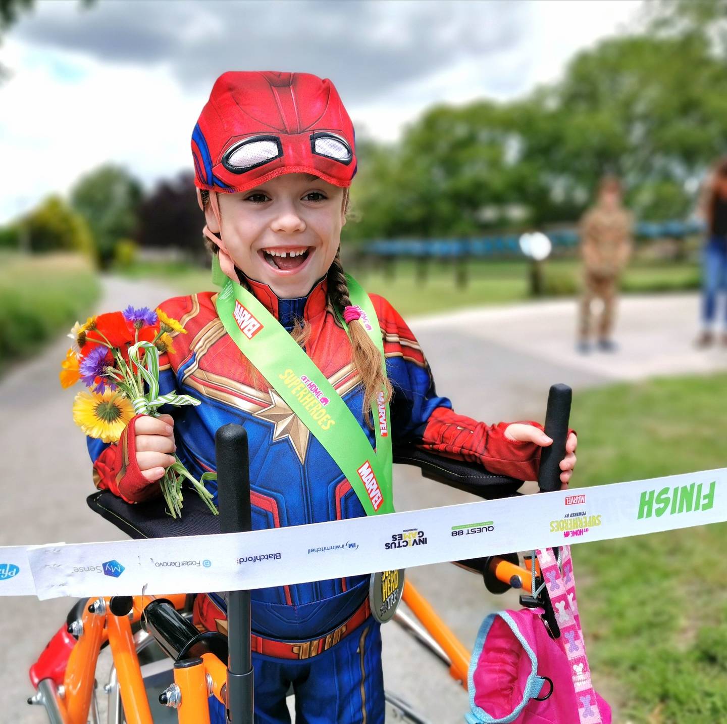 Young girl with Spiderman outfit on taking part in the Superhero challenge. 