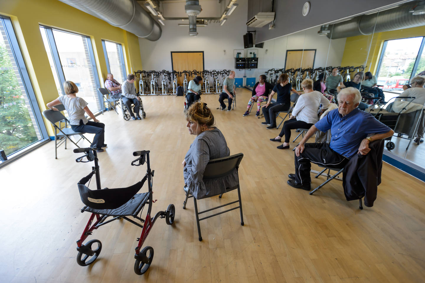 Group of disabled and non-disabled people taking part in movement and strength exercise class. Photo credit: Sport England