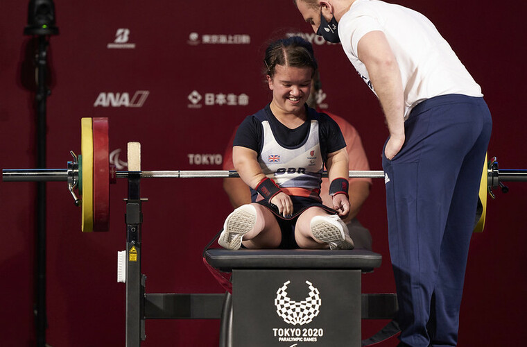 Powerlifter Olivia Broome celebrates after winning bronze in 50kg women event