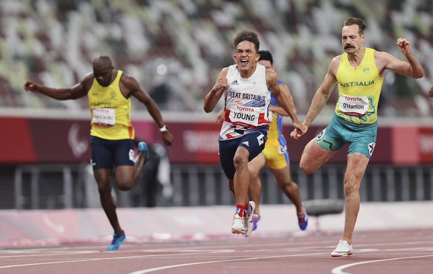 Sprinter Thomas Young winning gold in 100m T38