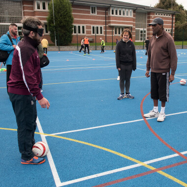 Players taking part in a British Blind Sport football session
