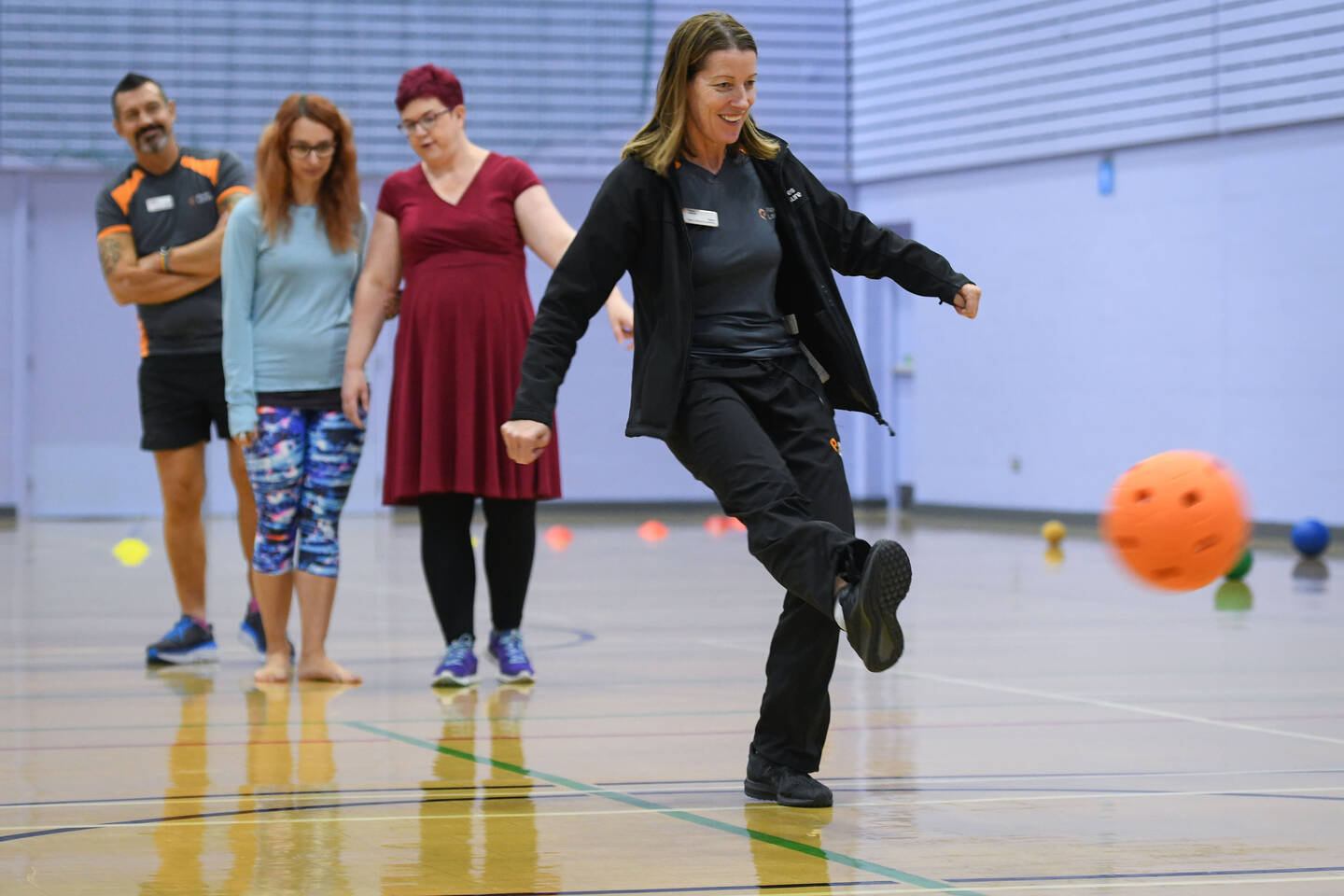 Woman taking part in activity during theInclusive Activity Programme practical workshop.