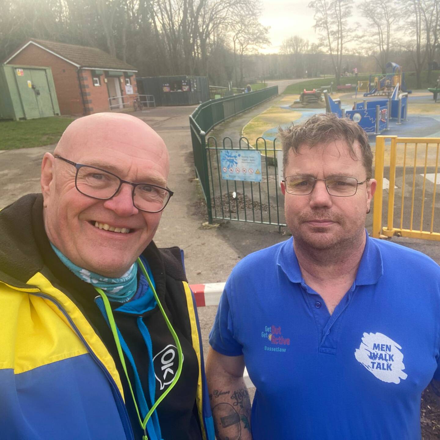 Volunteers Norman and Simon stood posing for a picture during a mens walk and talk session. 