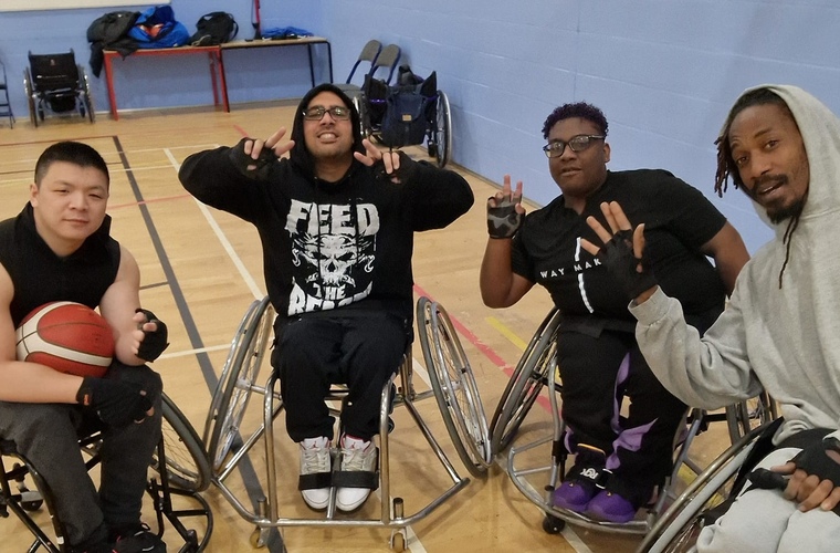 Four members of the Nottingham Lions wheelchair basketball team.