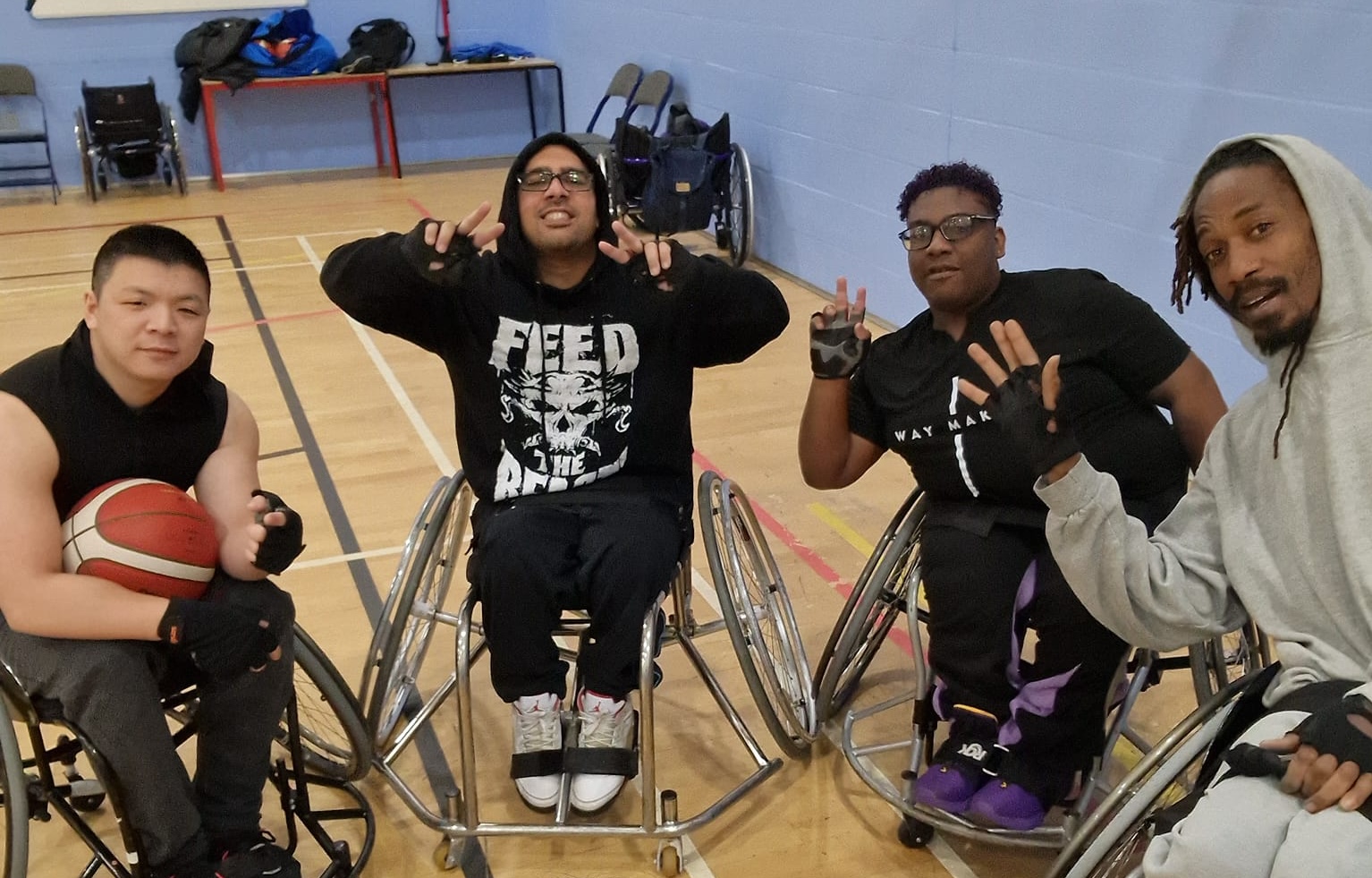 Four members of the Nottingham Lions wheelchair basketball team.
