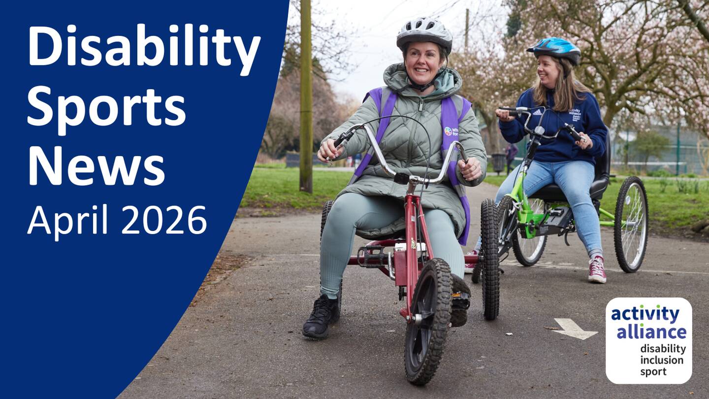 Two women ride adapted bikes in the park. They are both wearing helmets. Words on the graphic read 'Disability Sports News April 2026'.