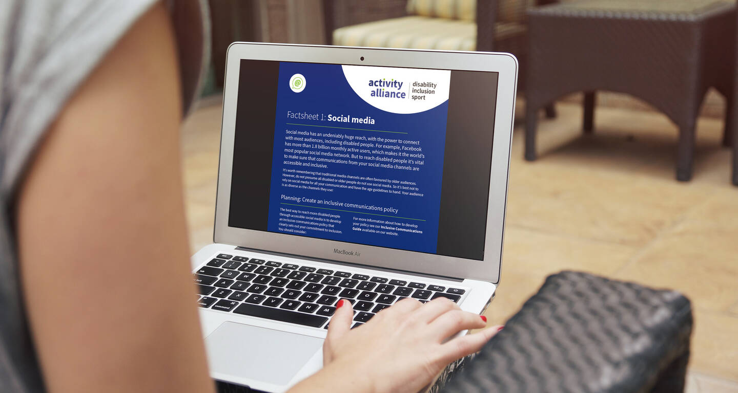 A laptop with a slide on it that reads social media.