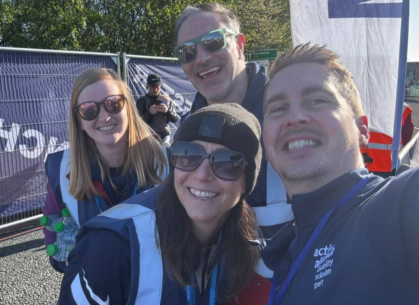A picture of four people at the Manchester Marathon.