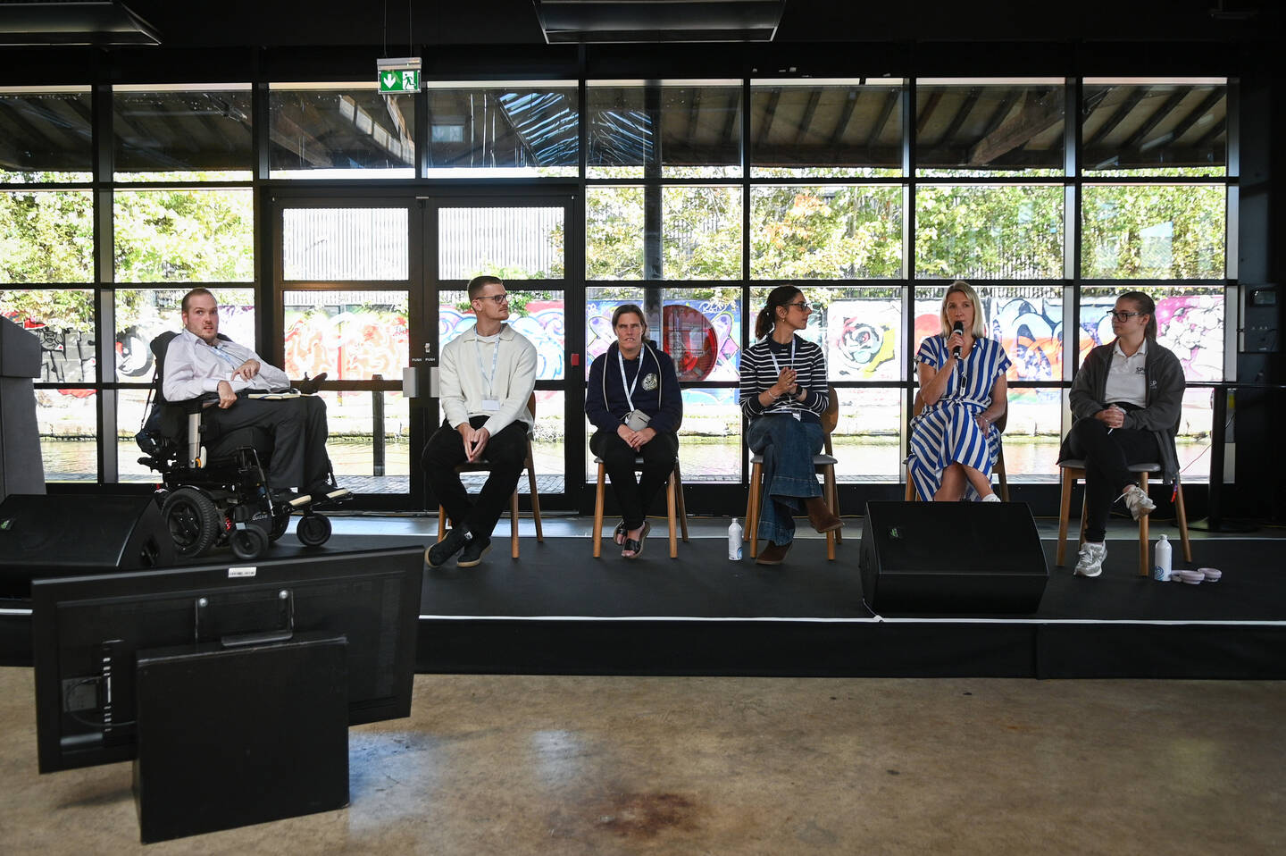 A group of disabled people on stage